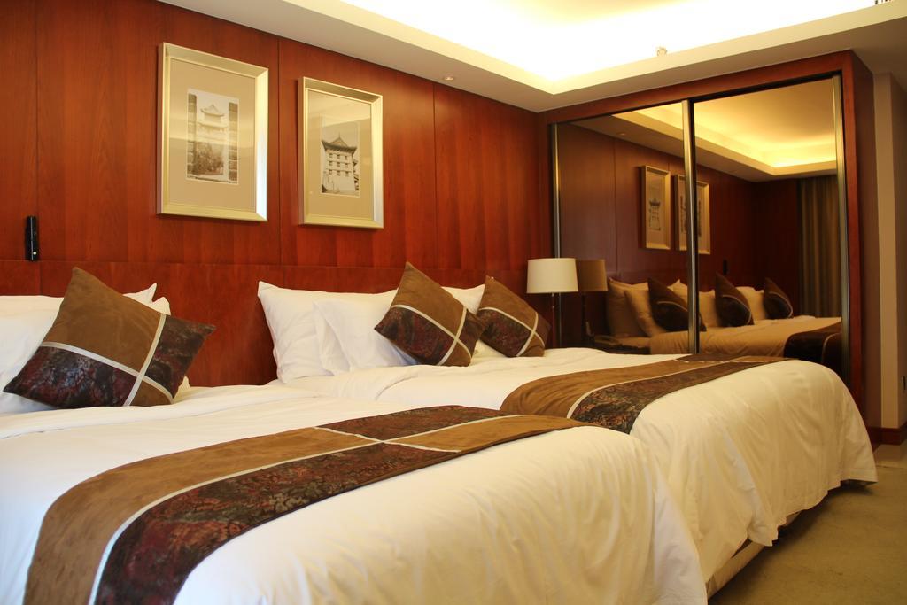 Xi'An Qu Jiang Yin Zuo Hotel Habitación foto